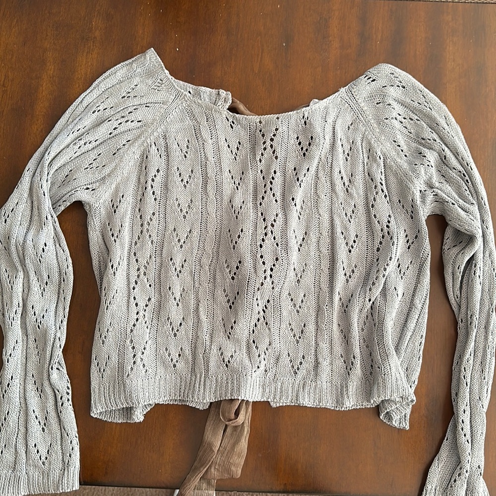 Cute sweater with three bowls on the back
